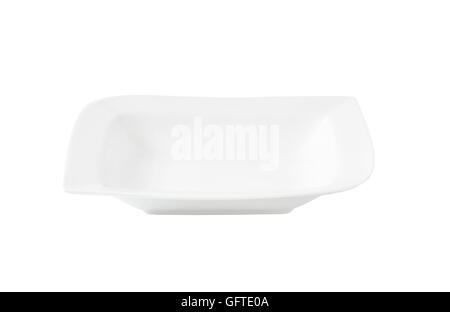 Weißen tief wellenförmigen quadratische Porzellanteller Stockfoto