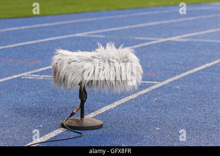 Big and furry professional sport microphone near the football field Stockfoto
