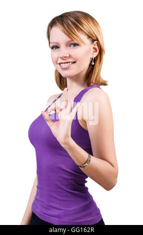 Junge schöne Frau zeigt OK Sign. Stockfoto