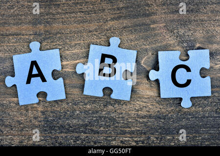 Puzzleteile mit Wort ABC Stockfoto