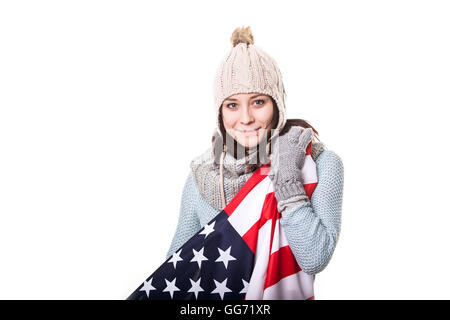 Fröhliches junges Mädchen mit USA Flagge auf einem weißen Hintergrund isoliert Stockfoto