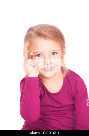 Porträt eines süßen kleinen Mädchens mit Bleistift in der Hand auf einem weißen Hintergrund im studio Stockfoto