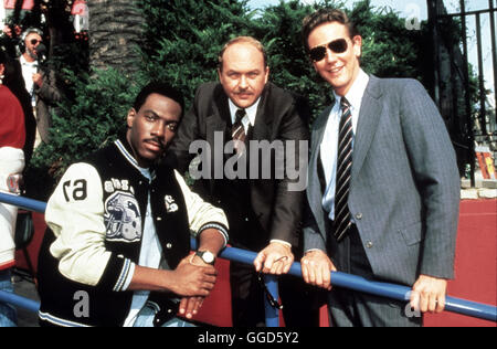BEVERLY HILLS COP / Beverly Hills Cop USA 1987 / Tony Scott Den Ungewöhnlichen Detroiter Polizist Axel Foley (EDDIE MURPHY) Modellbetrieben Ein Hilferuf aus Californien. In Beverly Hills Werden Banken Und Juweliere von Einer Bande Heimgesucht. Eine erfolgssichere Sporn Führt Foley Zum Örtlichen Schützenverein. Die Schießwütige Walküre Karla Scheint die Chefin der Bande Zu Sein. Doch Bevor Foley IGV Das Handwerk Legen Kann, Wird Ein Mordanschlag Auf Ihn Verübt...: Foto: Foley, Chief Harold Lutz (ALLEN GARFIELD), Billy Rosewood (JUDGE REINHOLD)-Regie: Tony Scott aka. Beverly Hills Cop Stockfoto