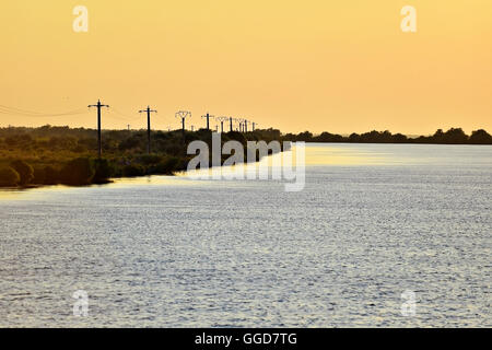 Sulina Zweig der Donau in Rumänien bei Sonnenuntergang Stockfoto