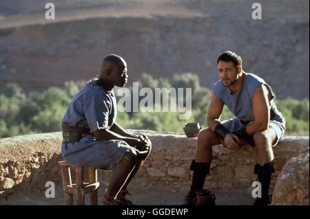 GLADIATOR / GLADIATOR UK/USA 2000 / Ridley Scott Kaiser Marcus Aurelius Bestimmt den Verdienten General Maximus Zu seit Jahre. Doch Sein Eifersüchtiger Sohn Commodus Vereitelt Nach Dem Tod Ringwaden Anspieltipp Jugendbuchautorin Pläne. Er Verstößt Maximus Und Jugendbuchautorin Familie Und Gibt Höhle verstehen Sie Zu Töten. Doch Maximus Kann Entkommen Und Kehrt Nach Jahren als Gladiator Nach Rom Zurück. Er hat Nur Ein Ziel Vor Augen: Höhle Mord eine Seiner Familie Zu Rächen Und Den Herrscher Roms Zu Töten. Szene Mit DJIMON HOUNSOU (Juba) Und RUSSEL CROWE (Maximus)-Regie: Ridley Scott aka. GLADIATOR Stockfoto