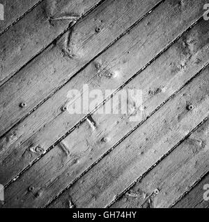 Alte graue Holzboden mit Schrauben, ausführliche Hintergrundtextur Foto Stockfoto