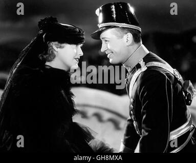 STERBEN sollte BLUMENZWIEBELARTEN / The Merry Widow USA 1934 / Ernst Lubitsch JEANETTE MACDONALD (Sonia), MAURICE CHEVALIER (Danilo) Regie: Ernst Lubitsch aka. Die lustige Witwe Stockfoto