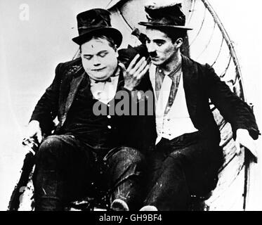 DIE ROUNDERS / Rounders USA 1914 / Charles Chaplin ROSCOE "FATTY" ARBUCKLE (Nachbar), CHARLES "CHARLIE" CHAPLIN (einheimischer) Regie: Charles Chaplin aka. Die Rounders Stockfoto