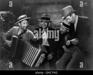 MAMMY USA 1930 Michael Curtiz Tambo (MITCHELL LEWIS) mit Akkordeon, Al Fuller (AL JOLSON), Wiesen (HOBART BOSWORTH) Lamellen (TULLY MARSHALL)-Regie: Michael Curtiz Stockfoto