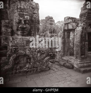 Stein-Gesicht von Avalokiteshvara Bayon Tempel, Angkor Wat, Angkor, Kambodscha. Stockfoto