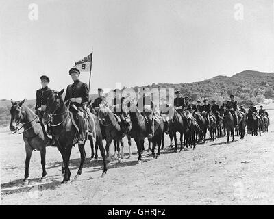 Land der Gottlosen - sterben Kadetten Jeb Stuart Und George Custer Absolvieren Die Abschlussklasse der Berühmten Militärakademie Westpoint. Auf Grund Seiner Herkunft aus den Südstaaten Wird Stuart Bei Einer Hitzigen Debatte von Dem Kadetten Rader als Sklavenhalter Beschimpft. Es Kommt Zu Einer Schlägerei, Worauf Rader Unehrenhaft Entlassen Wird. Foto: Szene Mit Jeb Stuart (ERROL FLYNN). Regie: Michael Curtiz aka. Santa Fe Trail Stockfoto