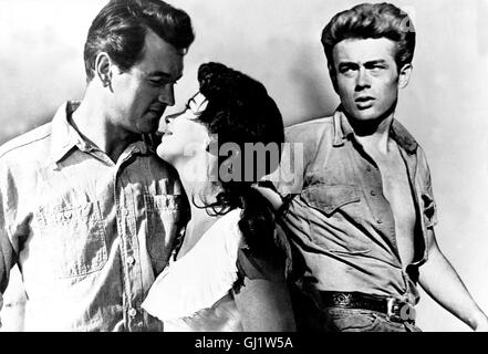 GIGANTEN Giant USA 1956 - George Stevens Der Junge Jett Rink (JAMES DEAN, Re) ist Gehilfe Auf der Ranch der Texanischen Grossgrundbesitzer Bick Und Leslie Benedict (ROCK HUDSON Und ELIZABETH TAYLOR), als er von Benedicts Schwester Ein Kleines Stück Land Erbt. Nach Jahren Mühsamer Arbeit Sprudelt Die Ersehnte Ölquelle. Über Nacht Zum Millionär Geworden, Fühlt Sich Jett Vergütungspolitik Höhle Benedicts Gesellschaftlich Gleichgestellt. Regie: George Stevens aka. Riese Stockfoto