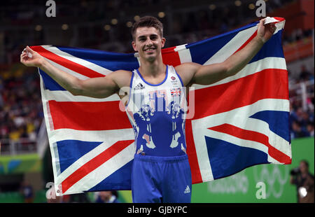 Am neunten Tag der Olympischen Spiele in Rio, Brasilien feiert Großbritanniens Max Whitlock gewinnen Gold am Pauschenpferd. Stockfoto