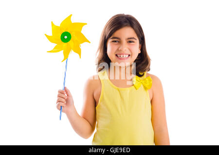 Kleine Mädchen spielen mit einem Spielzeug-Windmühle Stockfoto