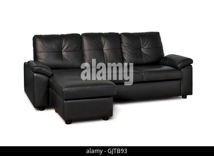 Schwarzes Ledersofa mit Hocker isoliert auf weißem Hintergrund Stockfoto