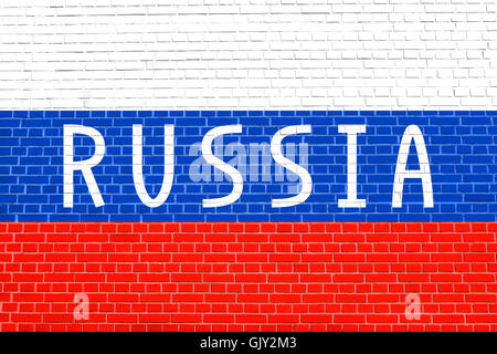 Flagge von Russland auf Ziegel Wand Textur Hintergrund. Russische Nationalflagge. Wort-Russland. Stockfoto