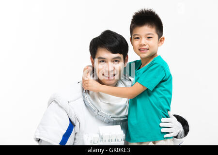 Studio gedreht, Astronauten und der kleine Junge Stockfoto