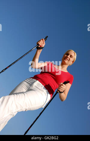 Frau nordic-walking Stockfoto