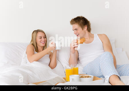 Frau-Betten-hotel Stockfoto
