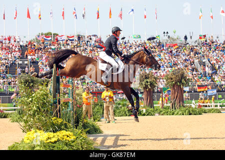 Rio de Janeiro, Brasilien. 19th. August 2016. Ben Maher von GBR bei 'Tic Tac' in Runde B des Olympischen Reitfinales in Rio de Janeiro, Brasilien Stockfoto