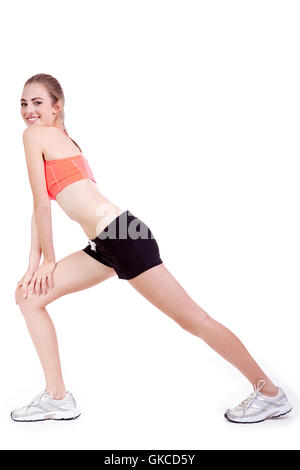 attraktive sportliche junge Frau stretching Übung Sport treiben Stockfoto