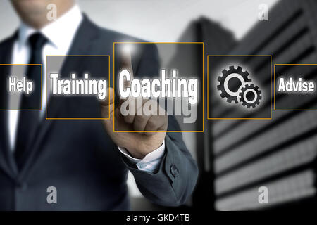 Coaching Touchscreen gesteuert Geschäftsmann. Stockfoto