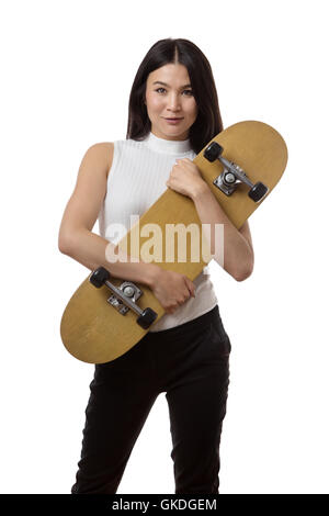 Geschäftsfrau hält eine Skateboard gedreht im studio Stockfoto