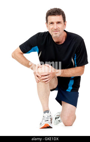 Erwachsene 1 in Sportswear und Knieschmerzen Stockfoto