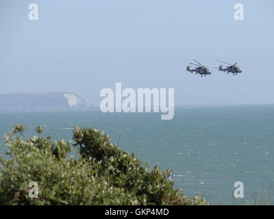 Bournemouth, UK. 21. August 2016. Schwarze Katzen Hubschrauber anzeigen Team bestehend aus zwei AW159 Wildcat HMA MK2 auf dem Display an Bournemouth Air Festival 2016. Bildnachweis: Nastia M/Alamy Live-Nachrichten Stockfoto