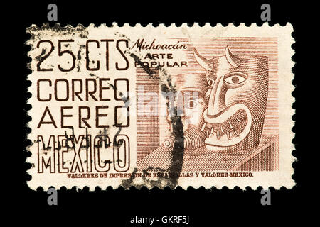 Briefmarke aus Mexiko, Michoacan Masken darstellen. Stockfoto