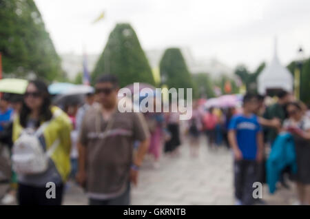 Bewegungsunschärfe von Menschen und Gruppe Tour zu Fuß gehen, auf Seite des Wat Phra Kaeo Tempel des Smaragd-Buddha oder Wat Phra S Reisen Stockfoto