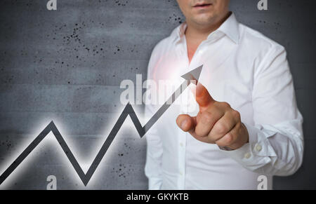 Graph-Touchscreen wird von Menschen betrieben. Stockfoto