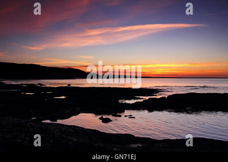 Sonnenuntergang über budle Bay Stockfoto