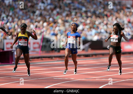 Hristania WILLIAMS, Shelly-Ann FRASER-PRYCE & Morolak AKINOSUN über die Ziellinie in der Frauen 100m Heat 1 bei der IAAF Diamond League London Jubiläumsspiele, Queen Elizabeth Olympic Park, Stratford, London, UK Stockfoto