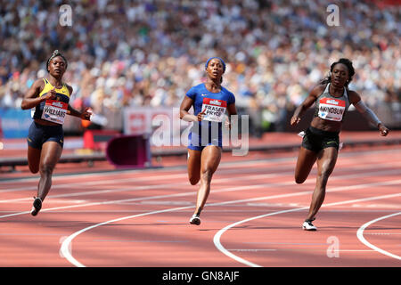 Christania WILLIAMS, Shelly-Ann FRASER-PRYCE & Morolak AKINOSUN über die Ziellinie in der Frauen 100m Heat 1 bei der IAAF Diamond League London Jubiläumsspiele, Queen Elizabeth Olympic Park, Stratford, London, UK Stockfoto