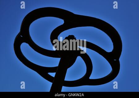 Silhouette der Bremsrad auf alte Eisenbahn caboose Stockfoto