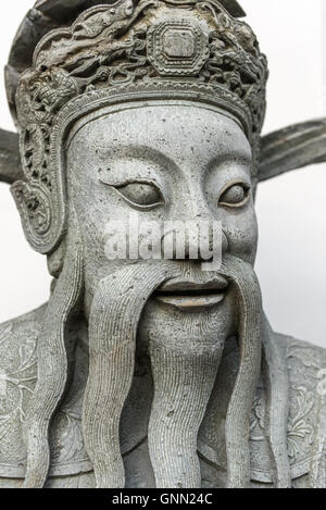 Chinesischer Krieger Wächter Statue im Wat Pho buddhistischer Tempel in Bangkok, Thailand Stockfoto