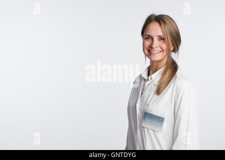 Schöne Krankenschwester Portrait auf weiß mit Textfreiraum Stockfoto