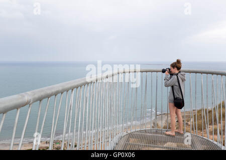 Mädchen fotografieren mit SLR camer Stockfoto