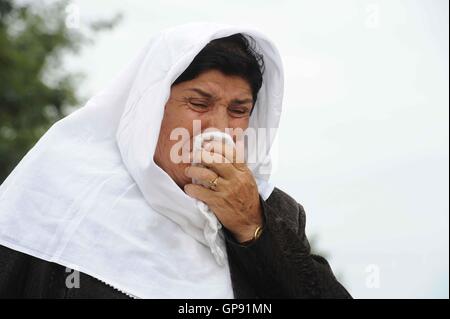 Samarkand, Usbekistan. 3. Sep, 2016. Eine Frau schreit nach dem Tod des verstorbenen Präsidenten des Usbekistan Islam Karimov in Samarkand, Usbekistan, am 3. September 2016. Die Beerdigung des verstorbenen Präsidenten des Usbekistan Islam Karimov fand in der historischen Stadt Samarkand, wo er geboren wurde. Bildnachweis: Sadat/Xinhua/Alamy Live-Nachrichten Stockfoto