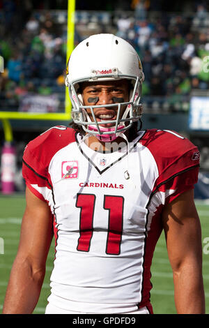 24. Oktober 2010; Seattle, WA, USA;  Arizona Cardinals Wide Receiver Larry Fitzgerald (11) an der Seitenlinie gegen die Seattle Seahawks im zweiten Quartal bei Qwest Field. Seattle besiegt Arizona 22-10. Stockfoto