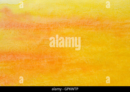 Orange Aquarell auf Papier Hintergrundtextur gemalt Stockfoto