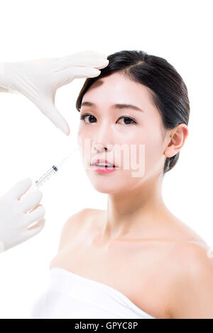 Plastische Chirurgie / kosmetische Botox-Injektion in der asiatischen Frau Gesicht
