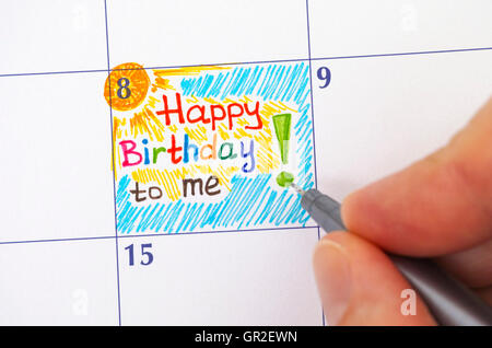 Person Hand mit Stift schreiben Erinnerung alles Gute zum Geburtstag zu mir im Kalender Stockfoto