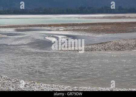 Trekking durch See Forggen Stockfoto