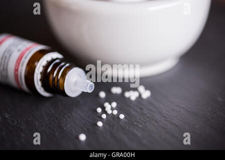 Kügelchen auf einer Schiefertafel Platte Stockfoto