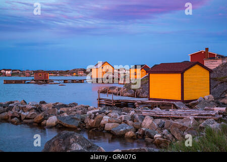 Saunière Häuser in Neigung, Fogo Island, Neufundland und Labrador, Kanada. Stockfoto