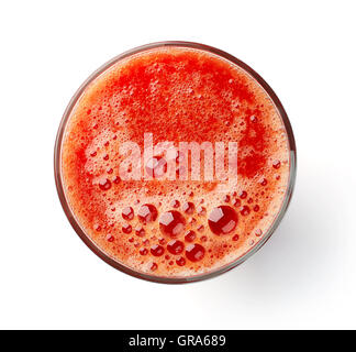 Glas frischer Tomatensaft isoliert auf weißem Hintergrund, Ansicht von oben Stockfoto