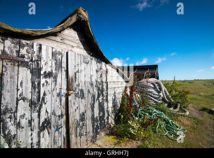 Berühmte umgedrehten Angelboote/Fischerboote am Strand von Lindisfarne, Holy Island Northumberland England UK Stockfoto