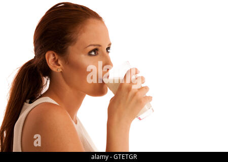 Frau trinkt Milch am Morgen isoliert auf weißem Hintergrund Stockfoto